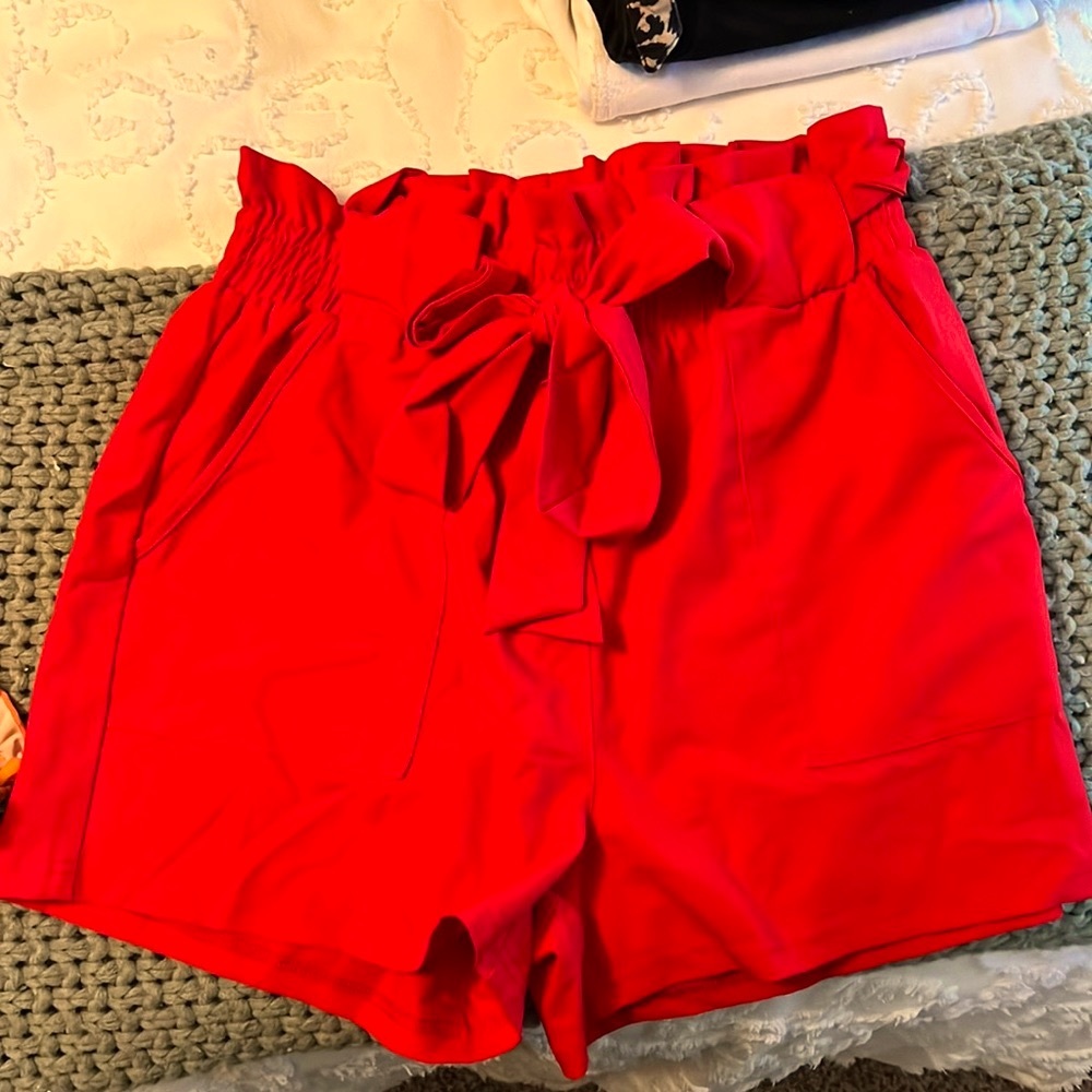Red high waist paper bag shorts. Size medium